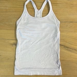 Lululemon ebb to flow tank with shelf bra in it